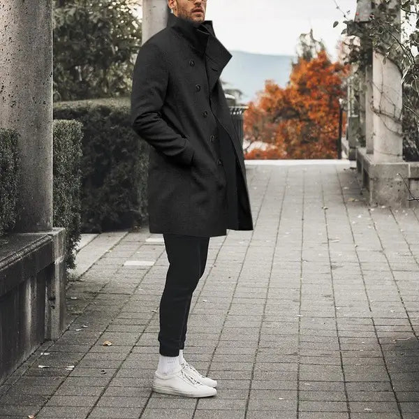 Black double-breasted wool overcoat with high collar and buttoned cuffs from men tweed trench coat stand collar casual jacket collection.