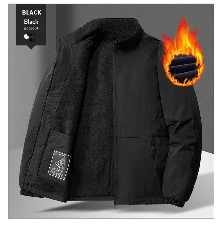 Black quilted fleece stand collar sports jacket featuring a half-zip closure, insulated lining, and elastic cuffs.