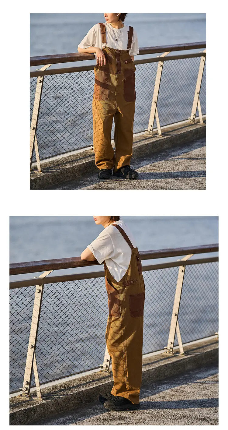 Khaki retro suspender overalls in tan patchwork denim with brown leather like pockets and straps.