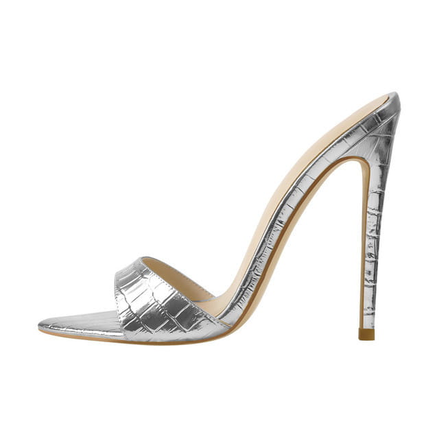 Silver pointed toe stiletto mule sandal with crocodile pattern and sleek metallic finish