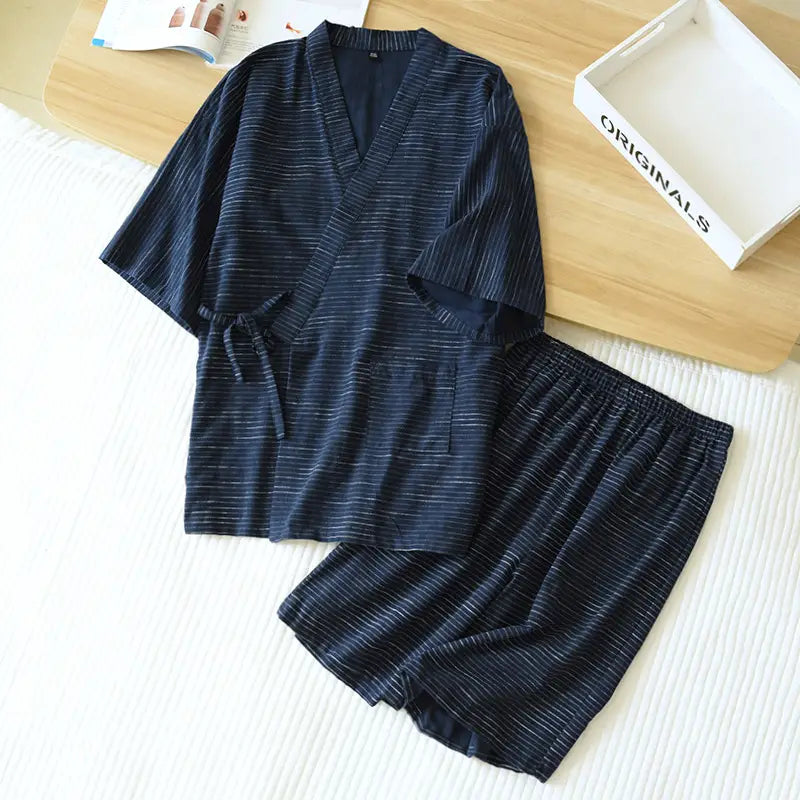 Dark blue striped cotton kimono pajama set for men with matching shorts displayed from the front.