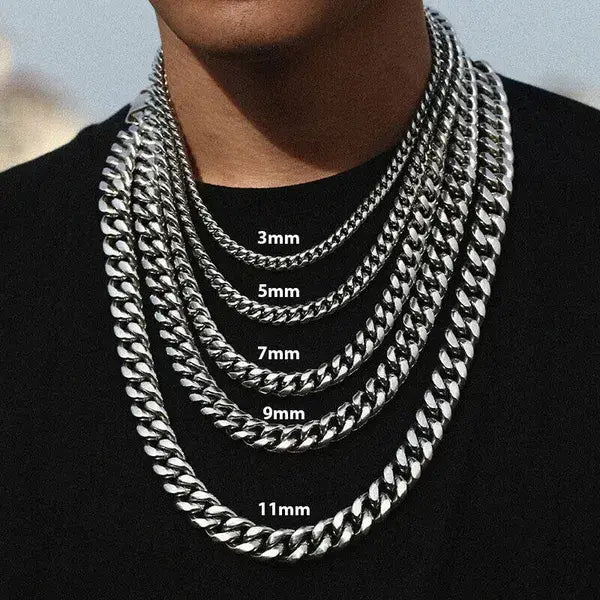 Set of five silver-toned unisex 18k gold plated stainless steel Cuban link necklaces in varying widths from 3mm to 11mm.