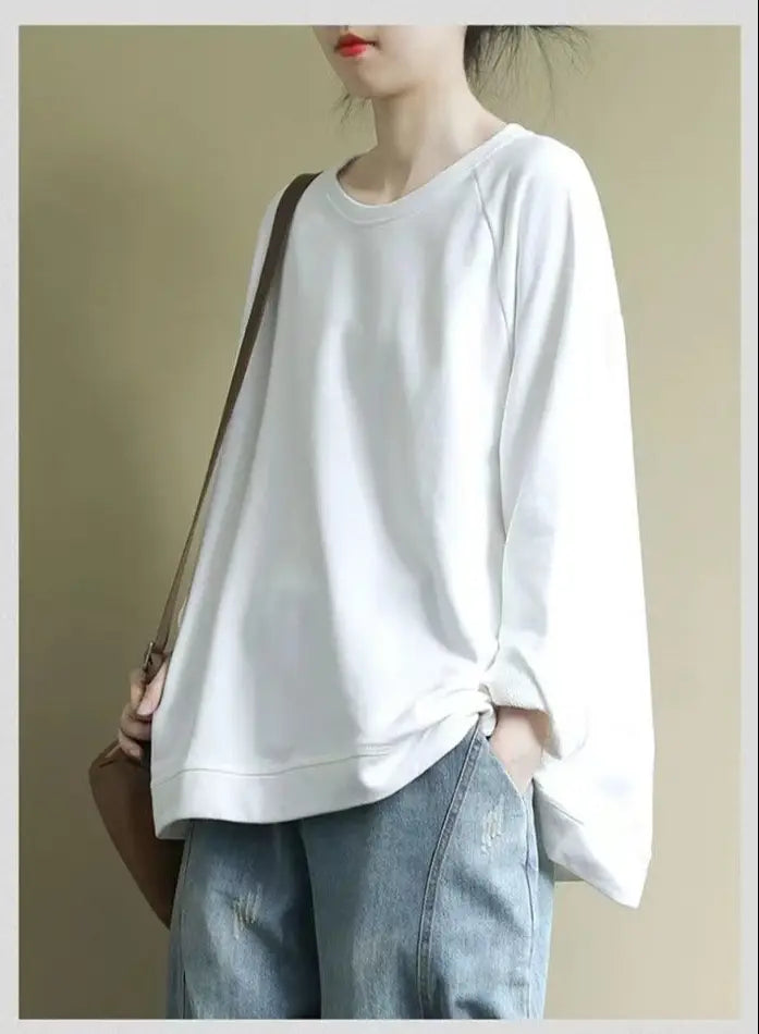 Women s relaxed oversized cotton blend pullover sweatshirt in white with long sleeves ribbed cuffs and a relaxed fit