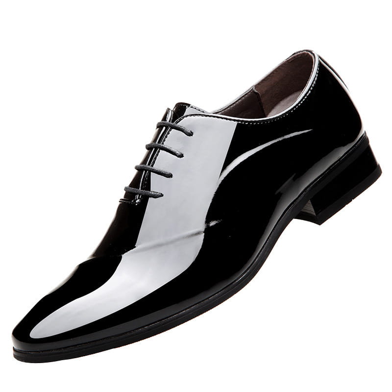 Men’s classic pointed toe leather business shoe in black patent leather with a glossy finish and white toe panel.