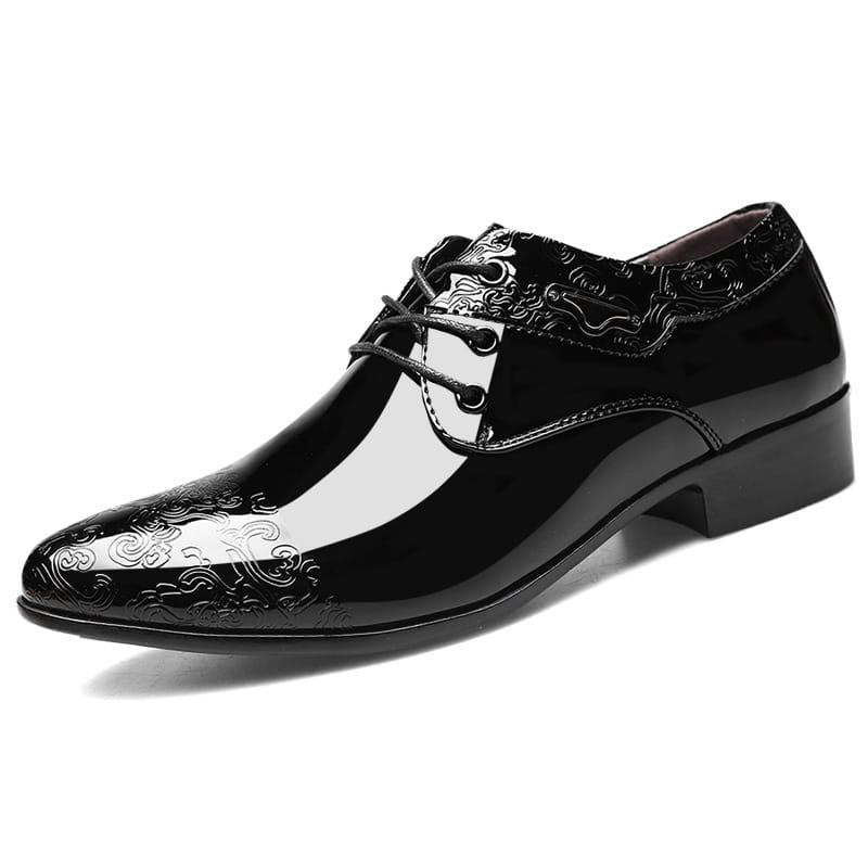 Black patent leather men’s formal business shoe with glossy finish and embossed cloud-like patterns on the toe vamp and collar.