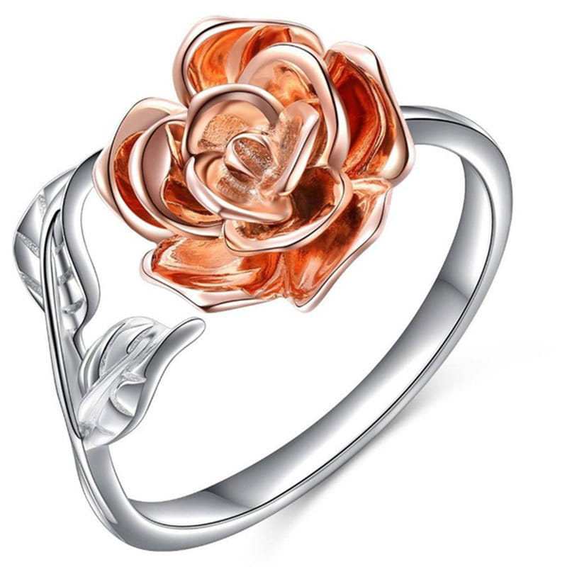 A delicate two tone rose and leaf adjustable silver ring featuring a rose gold flower and silver leaves on a sleek silver band.