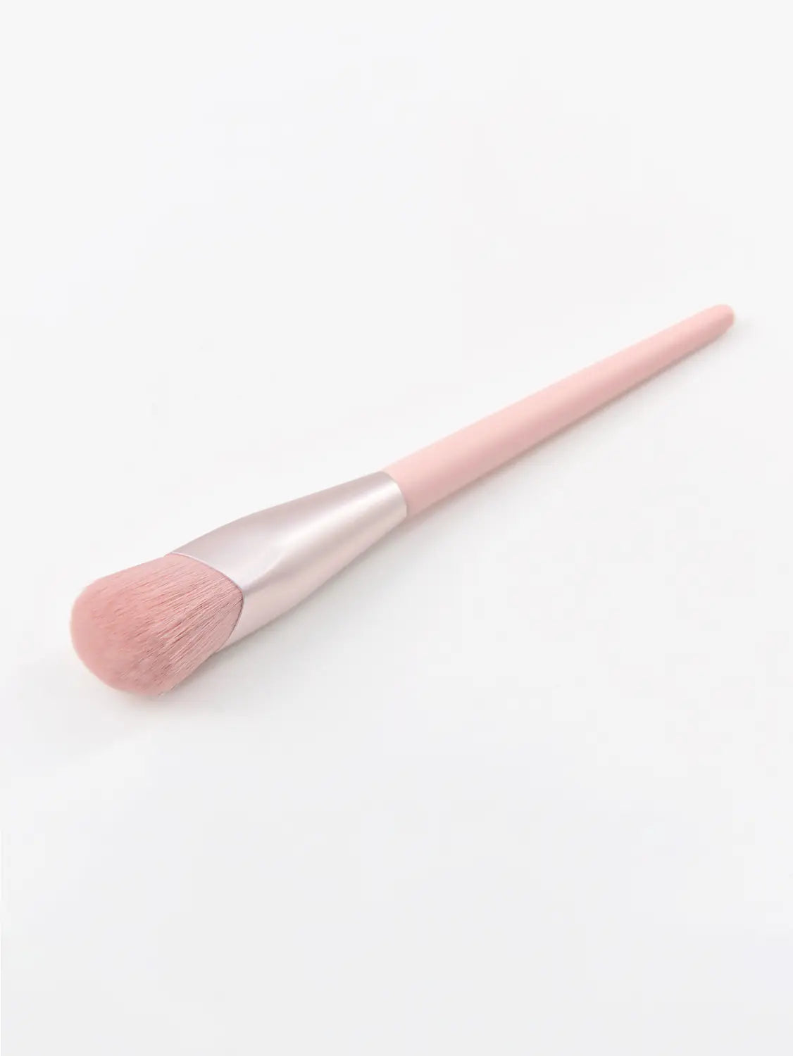 Finger belly makeup brush professional contour tool with pink soft fluffy bristles and sleek metallic silver ferrule.
