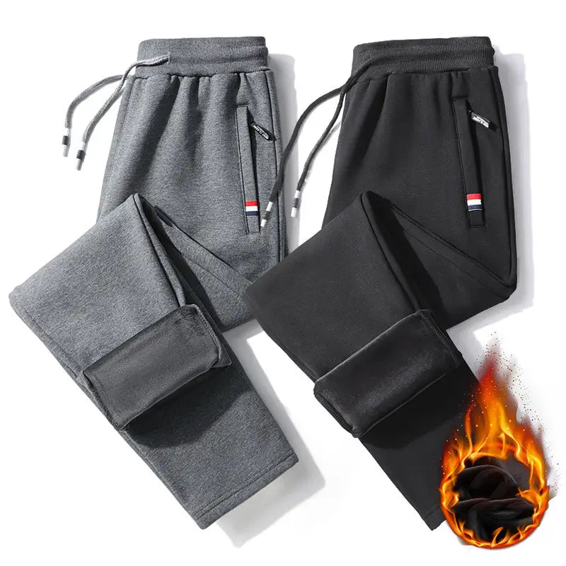 men fleece lined joggers in gray and black cotton with straight leg design drawstring waistbands and side pockets featuring small brand tags