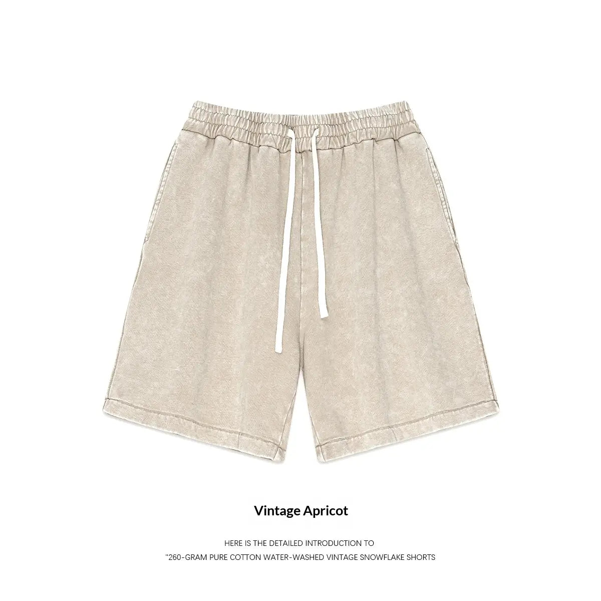 Beige distressed cotton shorts for men featuring a vintage snowflake pattern and white drawstrings ideal for summer apparel.