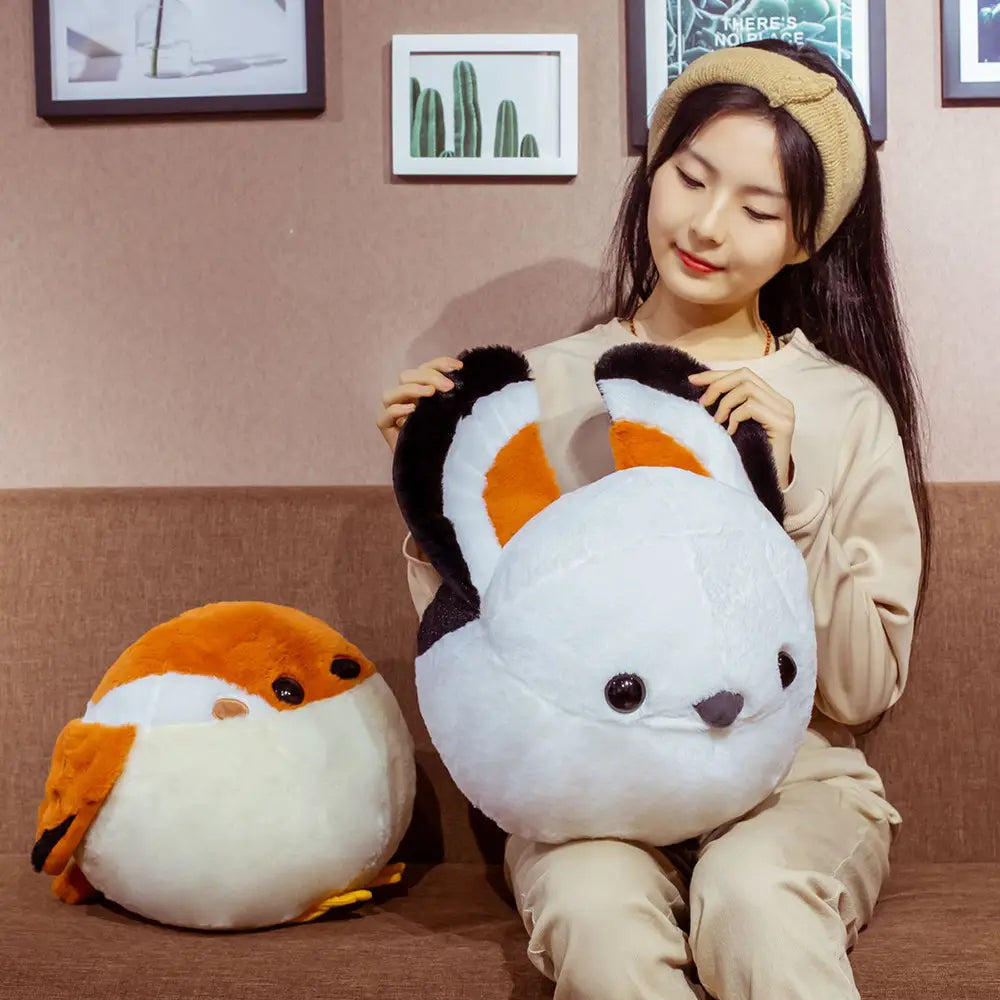 white and orange plush fox pillow with black ears and soft fabric texture featured in the Sparrow plush bird toy soft orange and white animal doll collection