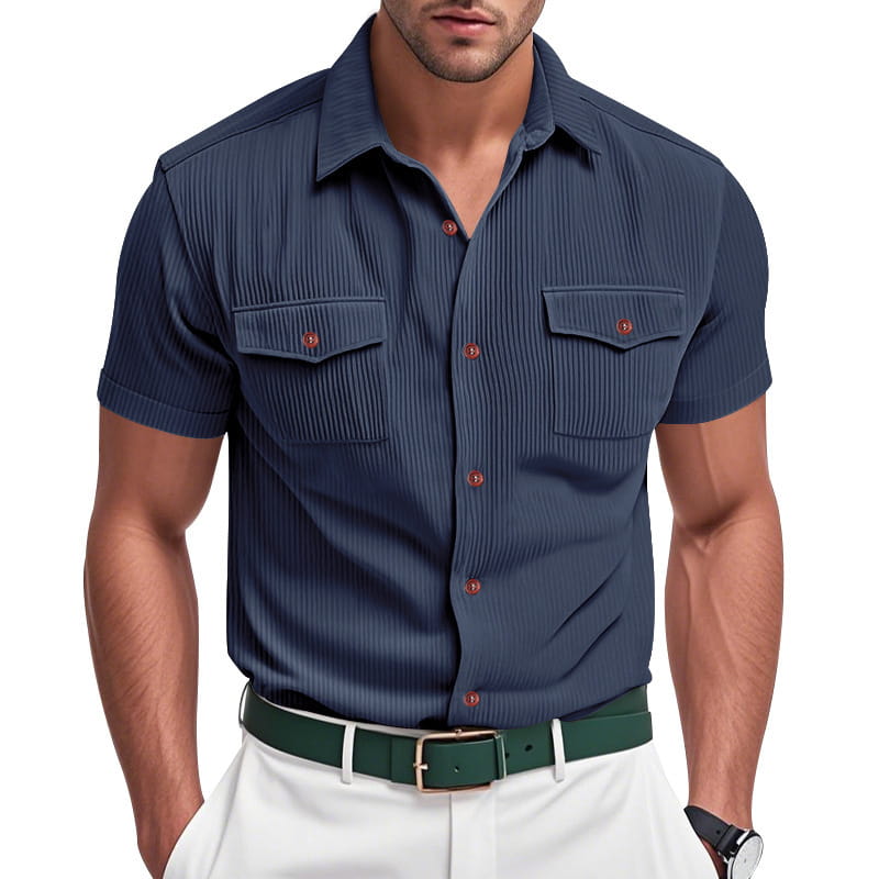 Navy blue loose corduroy short sleeve workwear shirt with vertical ribbed texture and red buttons.