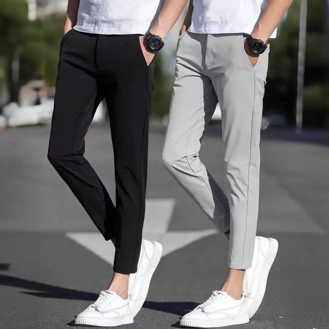 Herren-Chinohosen Slim Fit aus elastischer Baumwolle mit geradem Bein in Schwarz und Grau, mit cleanem modernem Design.