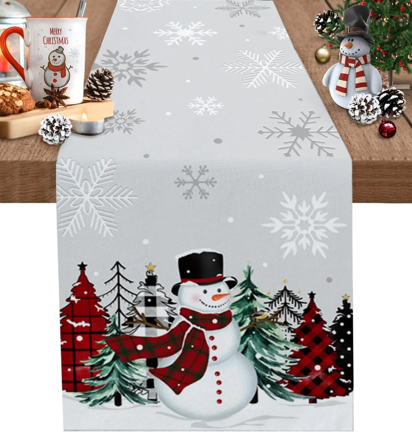a festive gray christmas table runner 183x33 featuring a cheerful snowman in a black top hat and red plaid scarf surrounded by pine trees and white snowflakes ideal for holiday decor