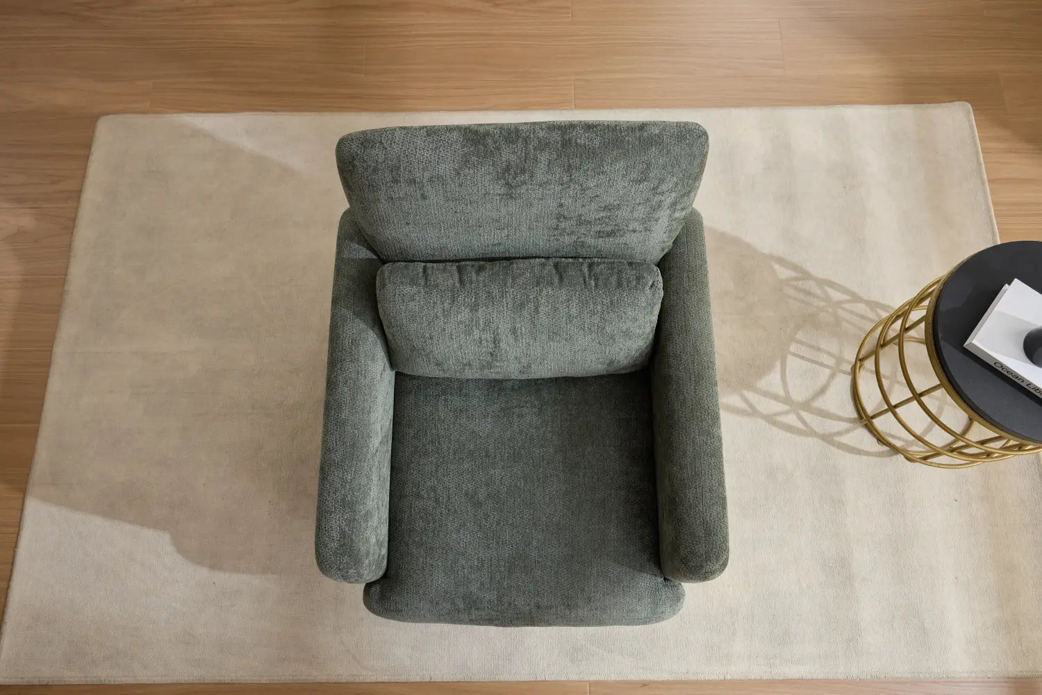 A cozy gray boucle fabric accent chair with soft textured upholstery and rounded arms designed as a modern upholstered armchair.
