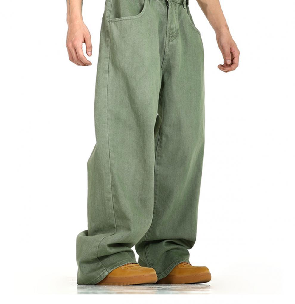 men’s vintage wide leg high waist relaxed denim jeans in olive green made from denim material displayed from the front.