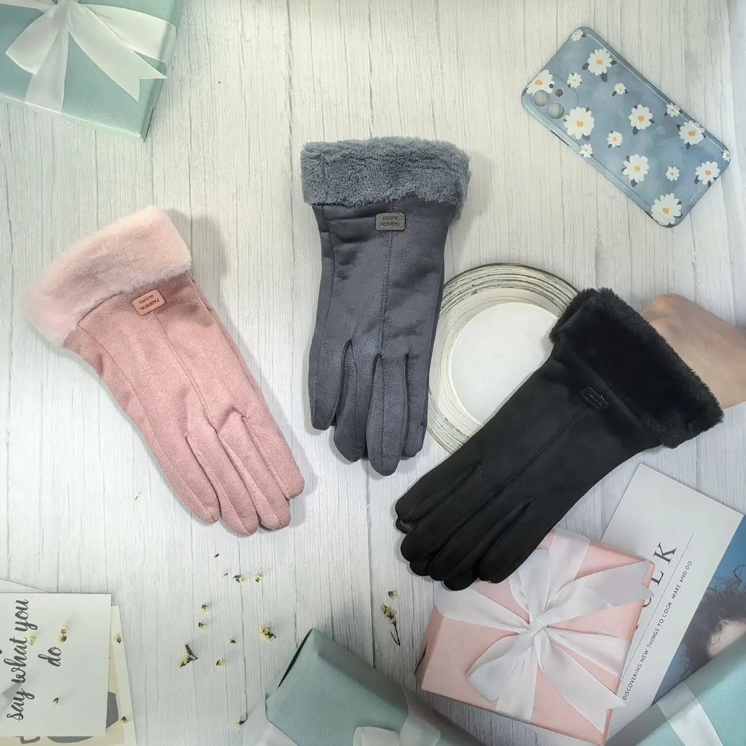 three pairs of women’s thermal suede touchscreen gloves in pink gray and black with plush faux fur cuffs shown from the back side