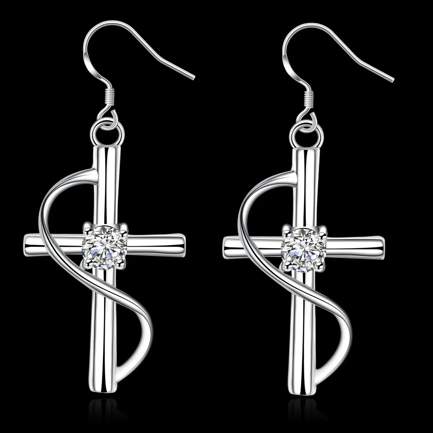 Elegant silver swirling gemstone cross earrings featuring a central clear gemstone and a sleek twisted wire design.