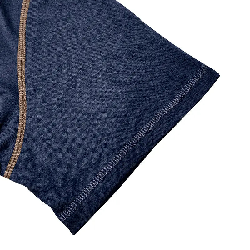 Navy blue Contrast Trim short sleeve Henley polo shirt featuring contrasting tan and white stitching along the seam.