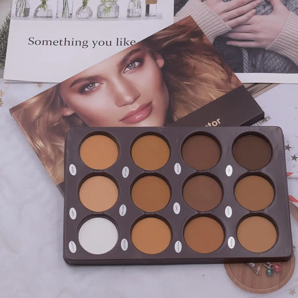 Dark brown rectangular 12 color contour palette with 15 circular compartments containing matte beige, tan, and white concealer face sculptor powders.
