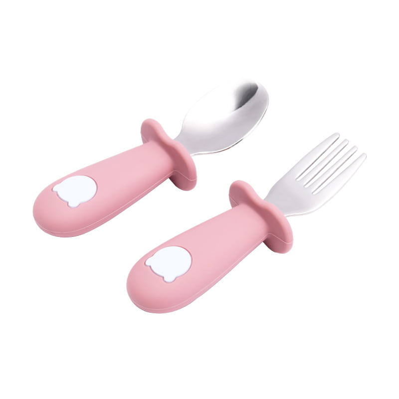 Ensemble cuillère et fourchette pour enfants à manches en silicone rose, avec des têtes en acier inoxydable, conçu pour l’utilisation d’ustensiles pour bébé.