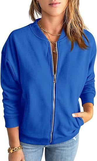 Royal blue velvet zip up bomber jacket with ribbed cuffs and hem shown from the front.