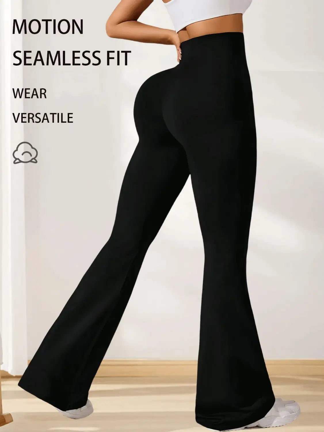 Leggings de yoga évasés en peau de requin à taille haute noire, avec conception d’ajustement sans couture pour des vêtements de sport confortables.
