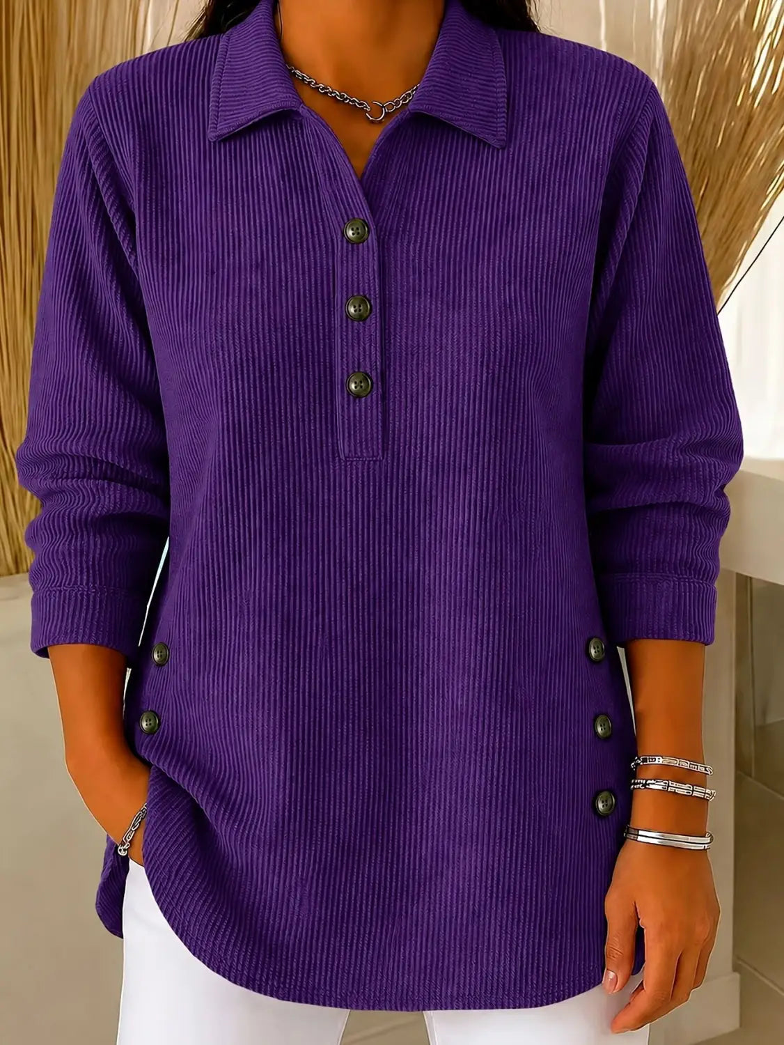 Purple corduroy ribbed button up sweatshirt long sleeve casual top with dark buttons and side button detailing.