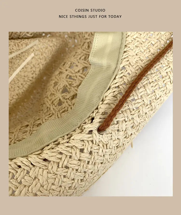 Beige woven straw cowboy hat for men featuring a light green ribbon trim and brown cord detail.