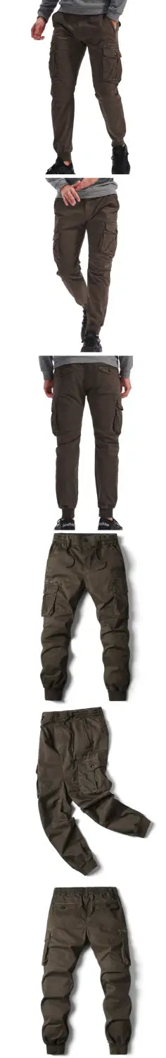 Men’s slim fit multi pocket cotton cargo work pants in dark olive green with tapered leg design and multiple pockets.