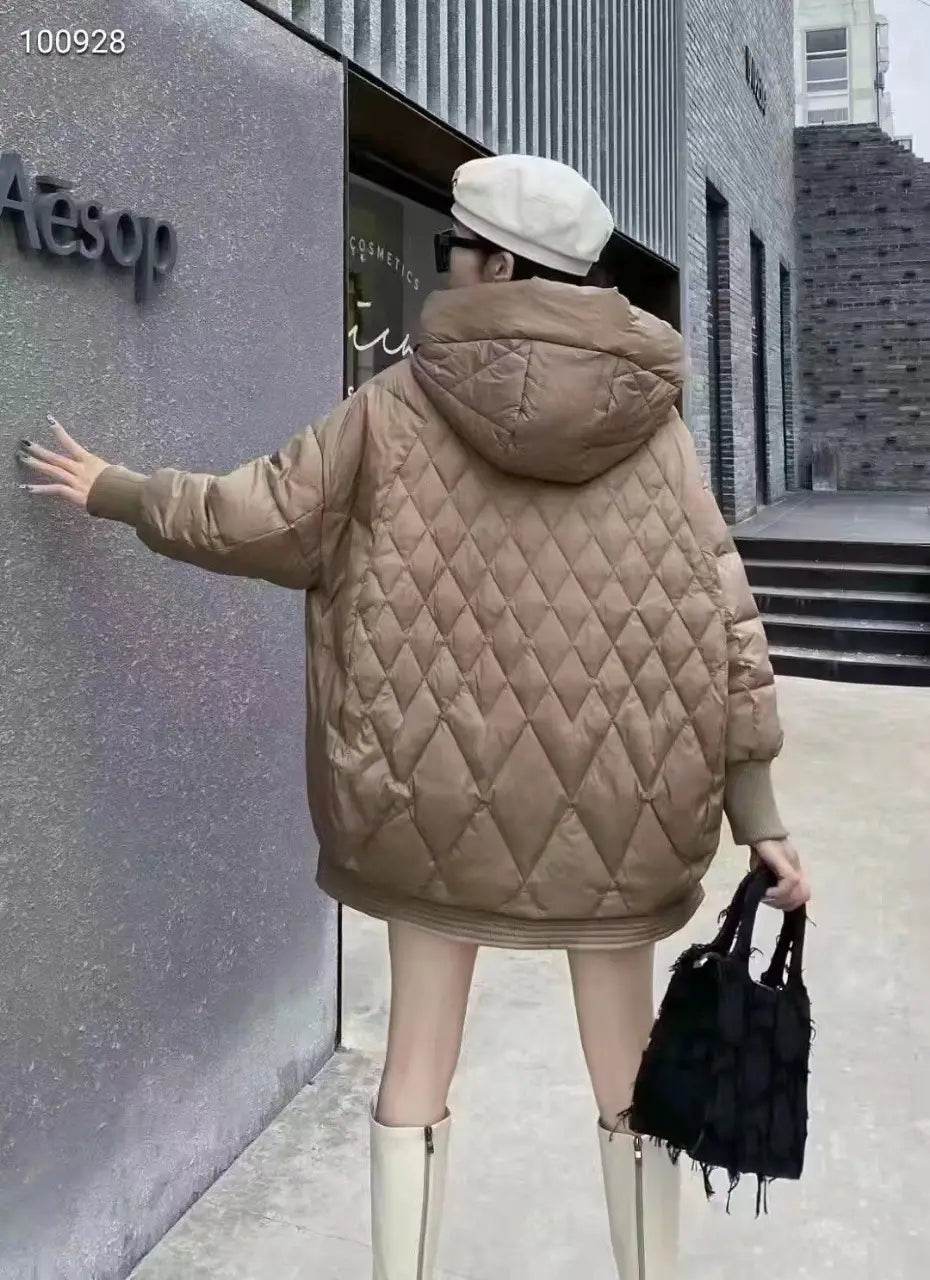 A beige quilted white duck down puffer jacket with a diamond pattern and a hood designed as a loose hooded winter coat.
