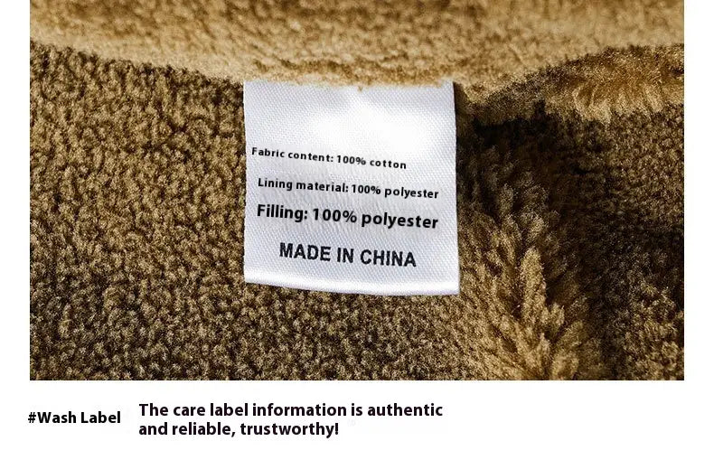 White care label stitched into brown plush fabric of men cotton shearling bomber jacket indicating 100 percent cotton exterior and polyester lining and filling.