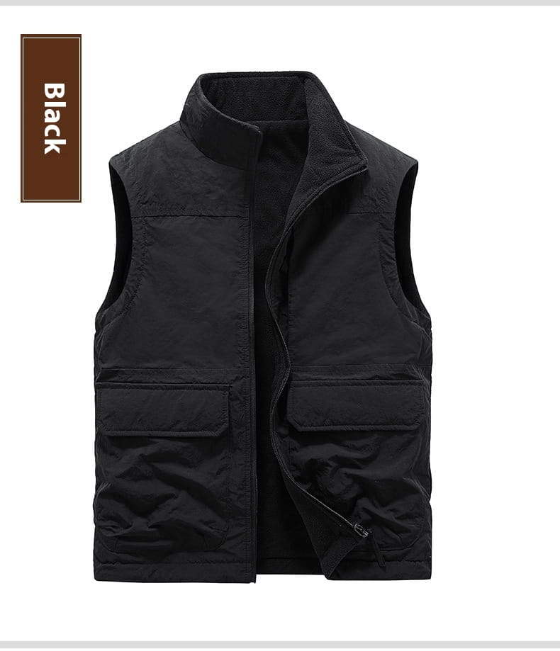 Black sleeveless fleece cargo vest with a high collar and two front pockets designed for reversible outdoor outerwear.