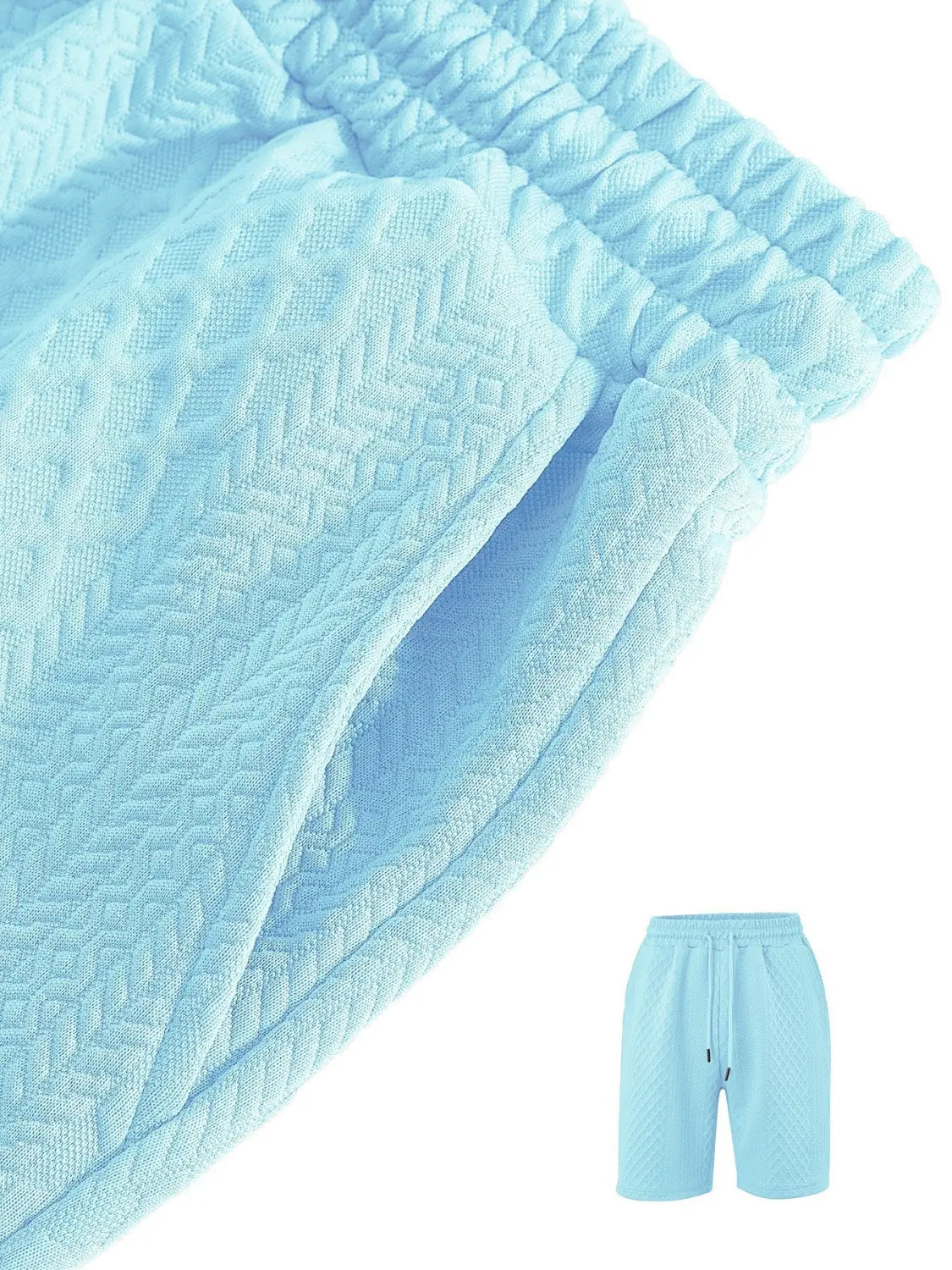 Light blue men’s textured short sleeve polo suit shorts featuring a quilted pattern and an elastic waistband.