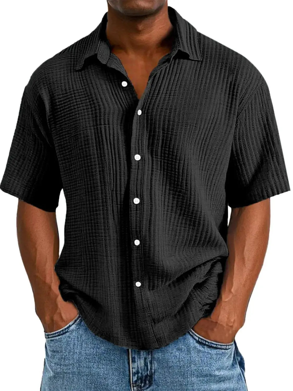 Men’s textured short sleeve button up shirt in black ribbed fabric with white buttons.