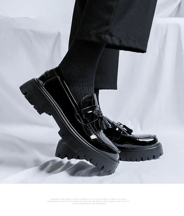 men’s black patent leather tassel loafer with chunky textured sole suitable for formal and casual wear