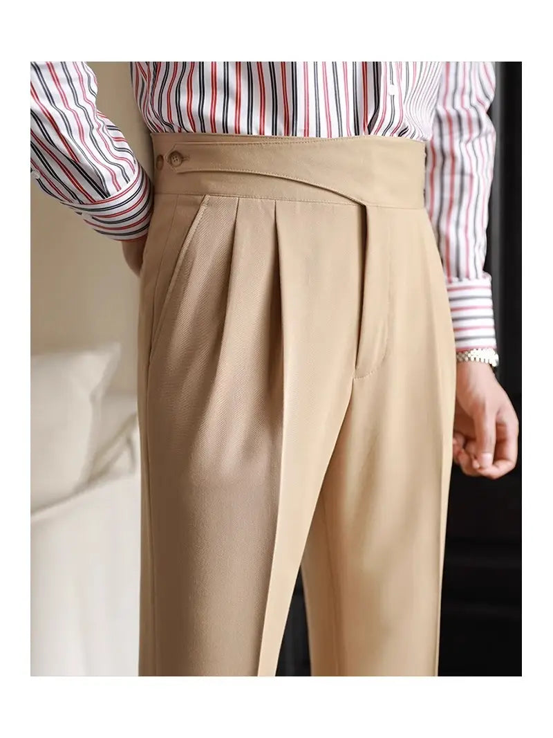 Beige pleated wool tailored trousers for men featuring a high waist and button closure with a straight leg cut.