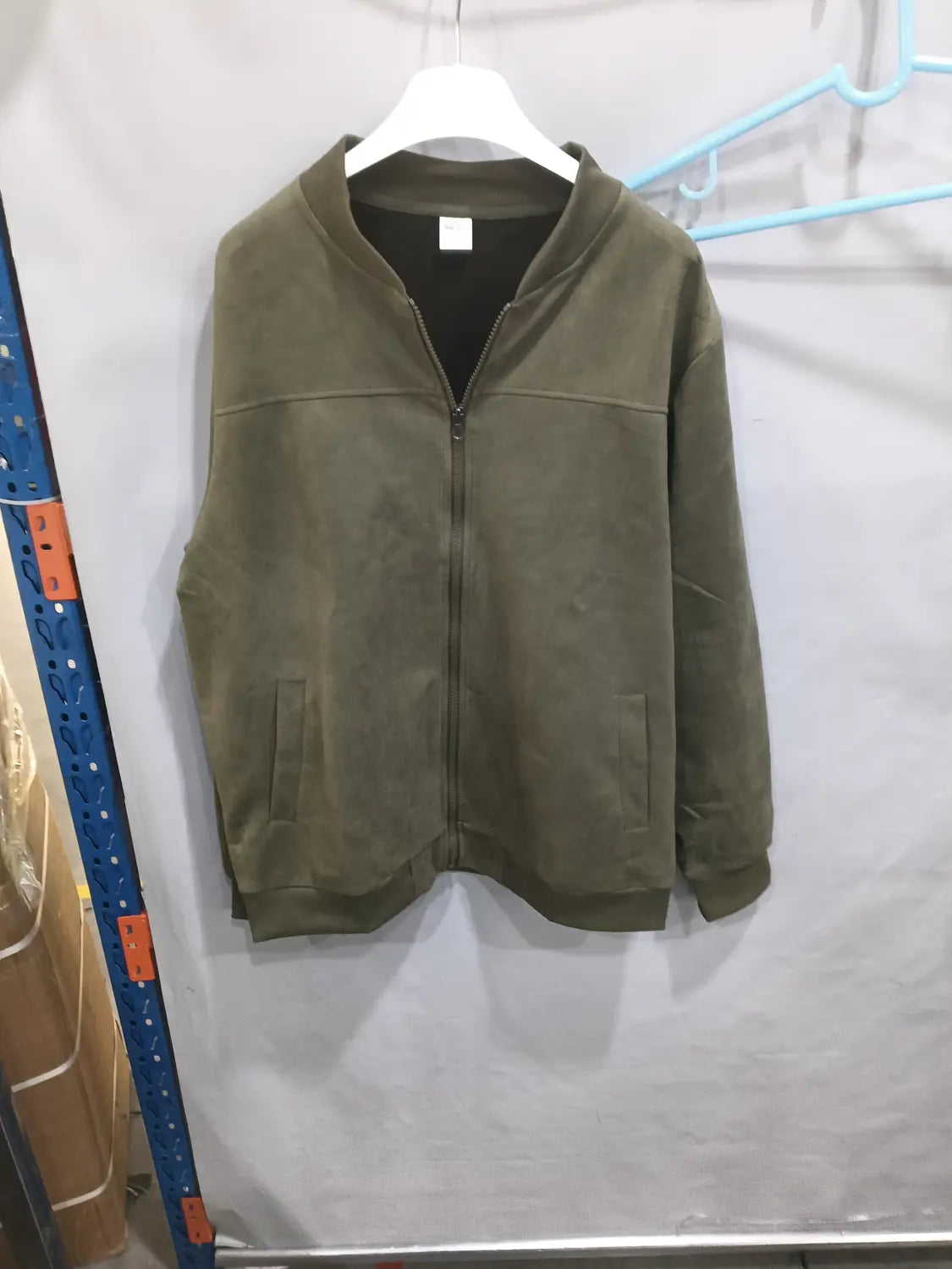 Men suede casual retro jacket in olive green with a soft textured fabric zip-up design and two front pockets.