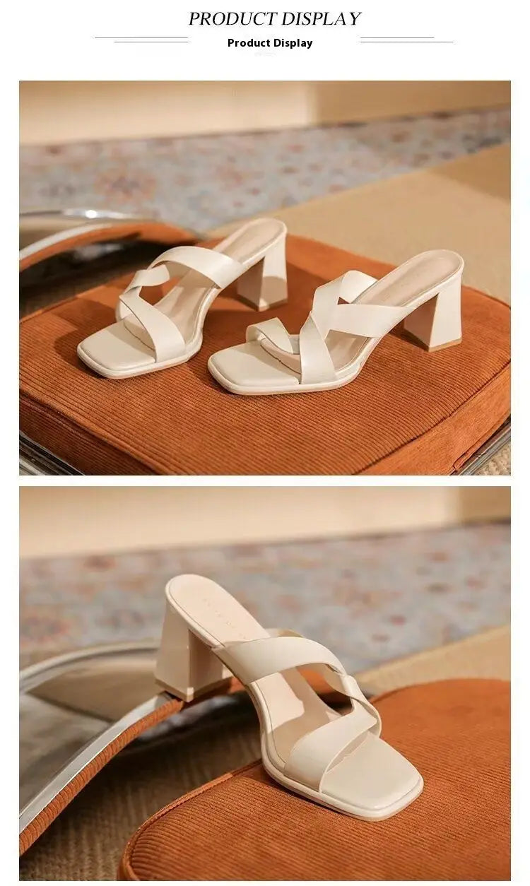 Cream-colored minimalist square-heeled mules with a sleek strappy design featuring chunky heel open toe crisscross straps.