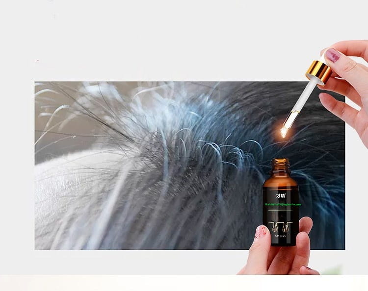 Un frasco pequeño de vidrio ámbar con una etiqueta negra y un tapón cuentagotas dorado que contiene 30 ml de sérum para el crecimiento del cabello con aceites esenciales.