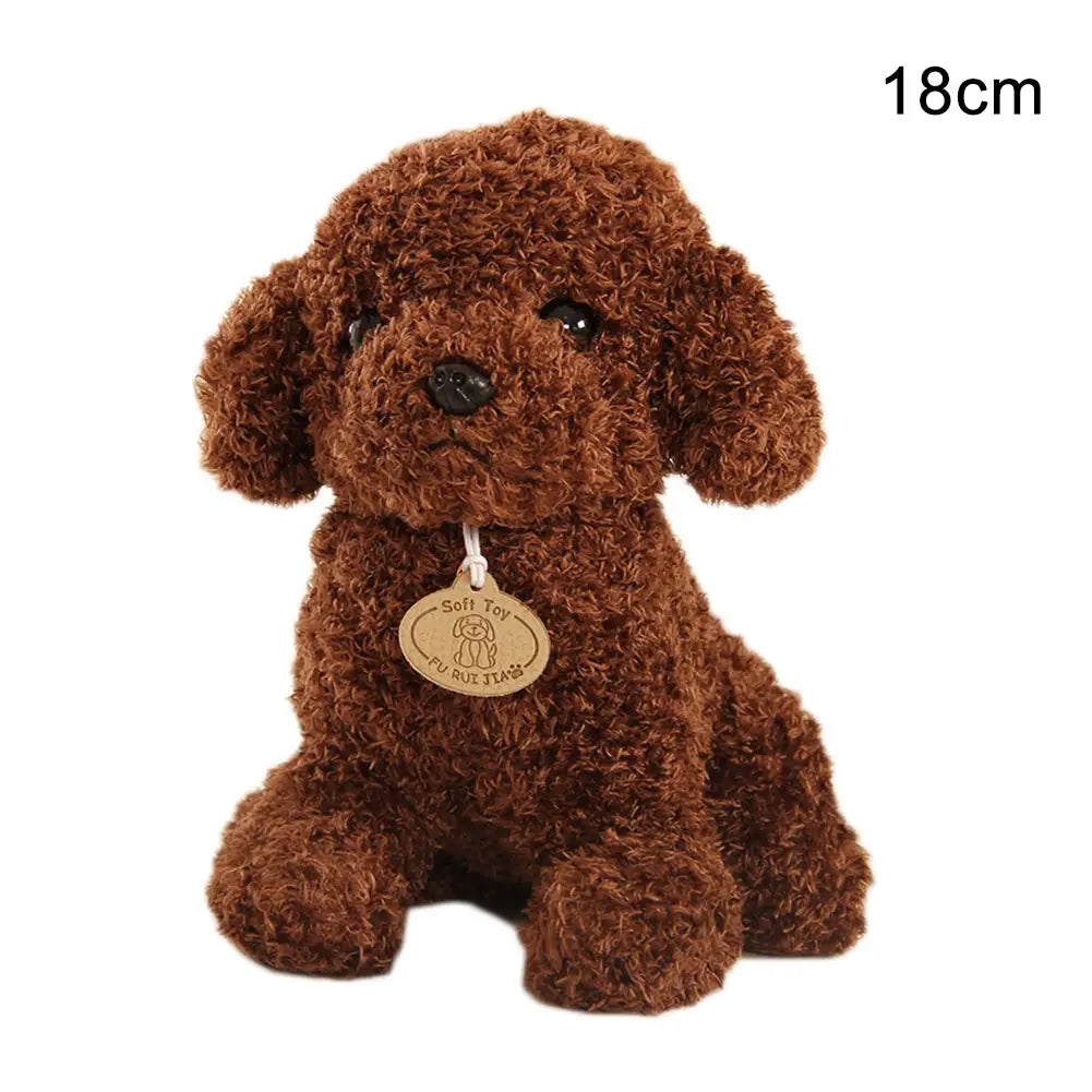 Un peluche de perro oso de peluche marrón, con forma de caniche esponjoso, pelaje rizado, ojos de botón negros y nariz, sentado en posición erguida.
