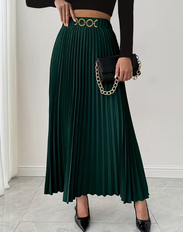 Emerald green pleated midi skirt with high-waisted a-line cut and gold-toned circular belt buckle.