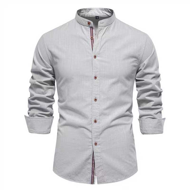 A light gray men’s slim fit linen blend shirt with long sleeves and a mandarin collar featuring subtle red and white striped trim along the placket.