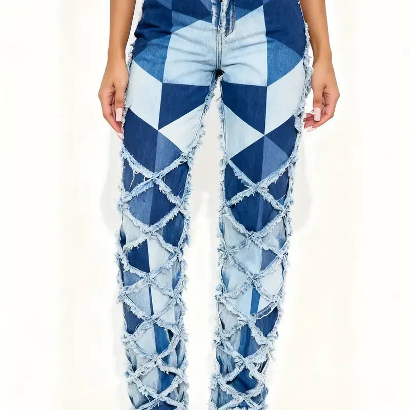 Straight leg jeans medium wash feature a blue and white geometric pattern on denim with a distressed lace-like cutout design along the legs.