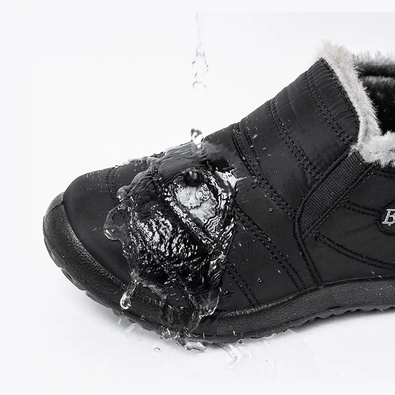 Men snow boots lightweight waterproof winter shoes in black with plush gray lining and stitched panel design.
