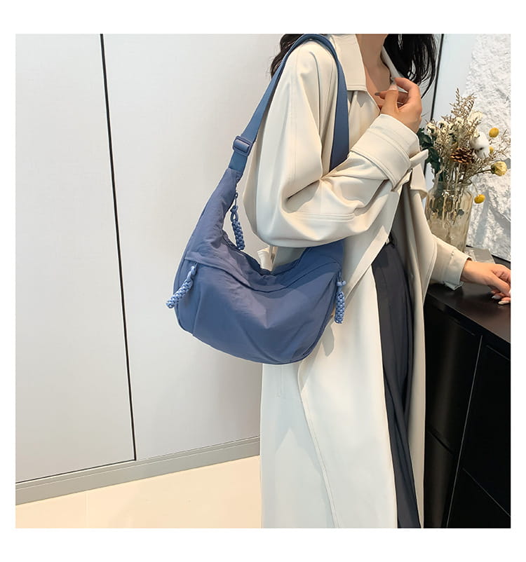 Blue nylon crossbody shoulder bag with braided tassels large capacity hobo style for everyday use