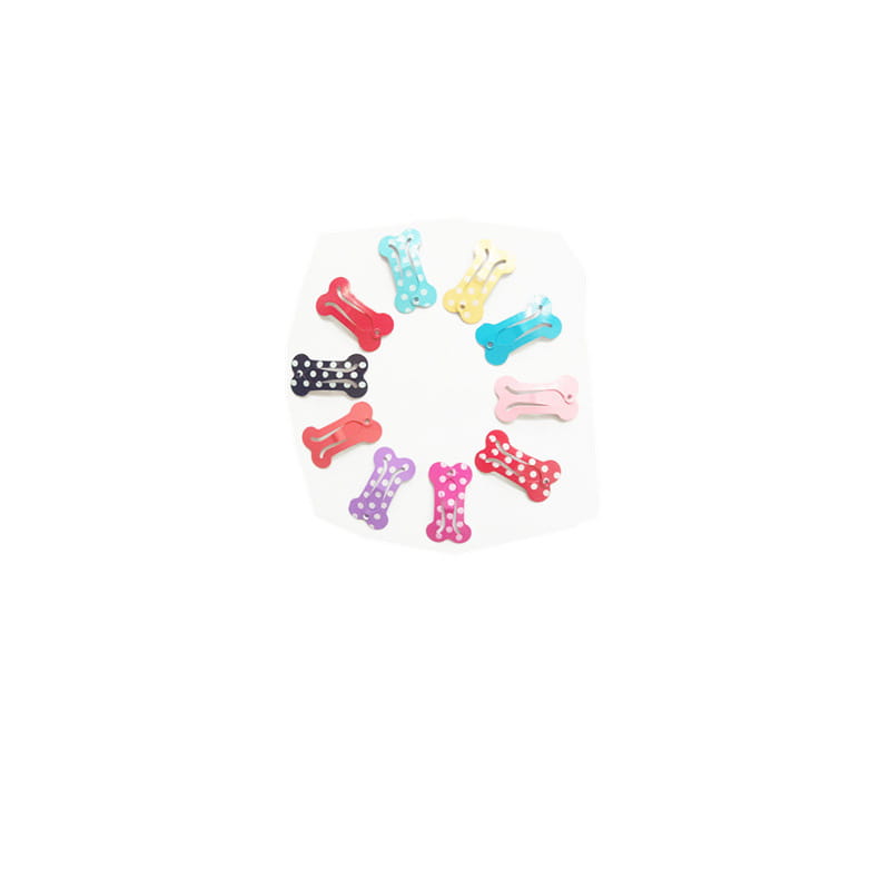 a set of colorful bone shaped metal dog hair clips featuring solid hues red blue yellow pink purple black with white polka dots and a glittery finish for pet barrettes.