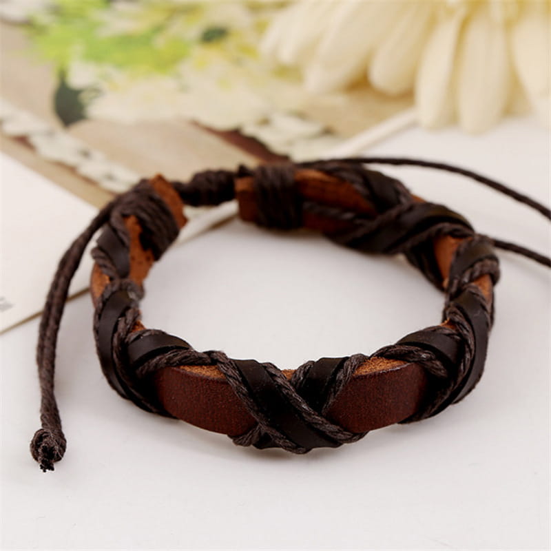 brown leather braided bracelet with woven dark brown cords and adjustable string ties from the Asgard braided leather Nordic bracelet set.