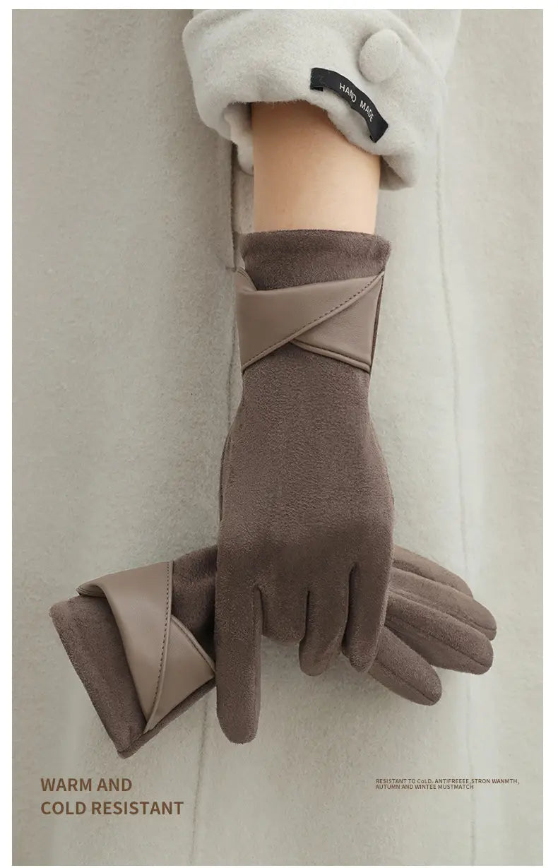 Beige suede and leather touchscreen fleece lined bow gloves showing the back side with a cross wrap design on the wrist.