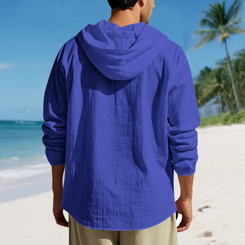 A vibrant royal blue men linen hooded cardigan shirt made of lightweight textured fabric.