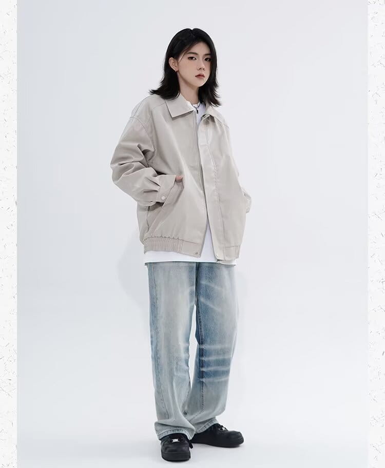 Men’s beige faux leather bomber jacket with relaxed fit and ribbed cuffs designed as outerwear.